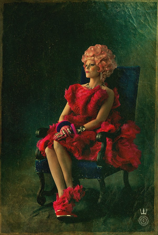 Illustration for article titled Catching Fire character poster pays tribute to the Hunger Games's unsung hero: Buttercup